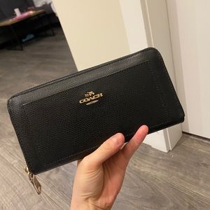 Coach black leather accordion zip wallet